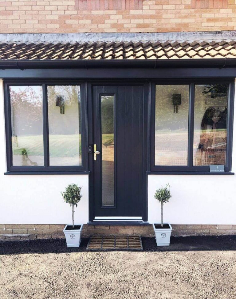 grey composite door cross inn